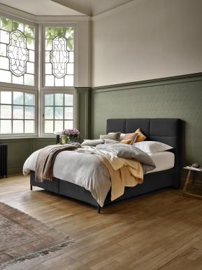 Een bed om in thuis te komen 